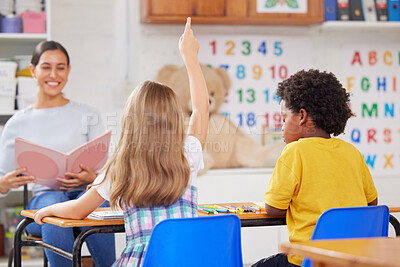 Buy stock photo Shot of a young woman teaching a class of preschool children