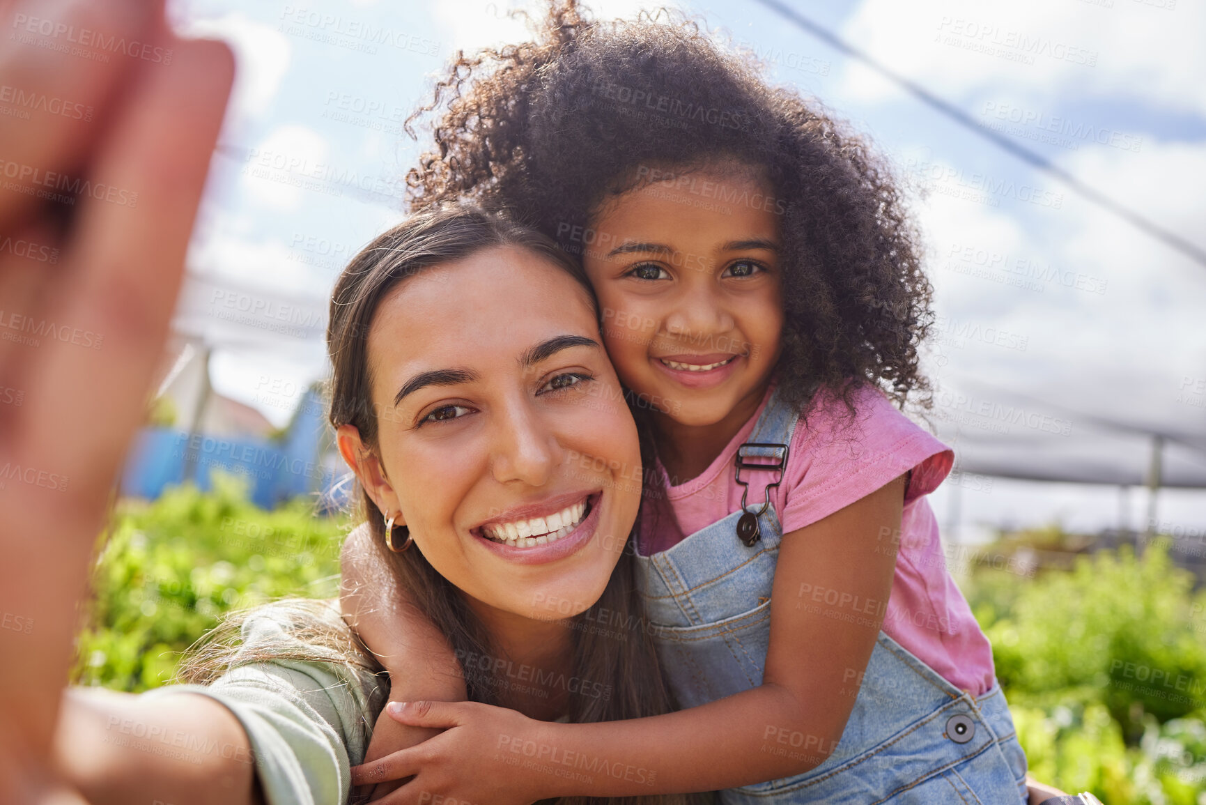 Buy stock photo Cropped selfie of an attractive young woman and adorable little girl working on a farm