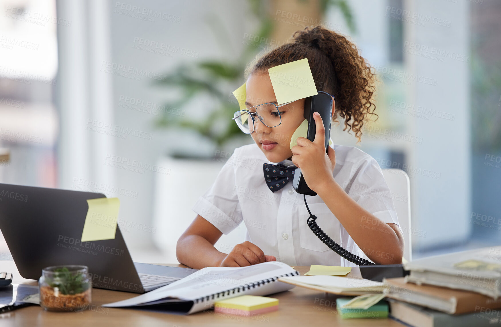 Buy stock photo Business, phone call and child with telephone and laptop at desk for conversation, discussion and contact. Communication, stress and young girl with sticky notes for planning, deadline and network
