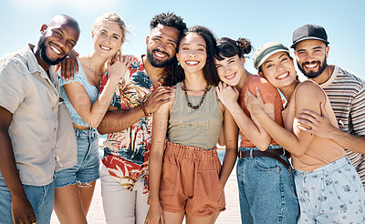 Buy stock photo Shot of a diverse group of friends standing together and bonding during a day outdoors