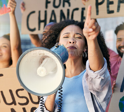 Buy stock photo Cropped portrait of a group of young people protesting in the city