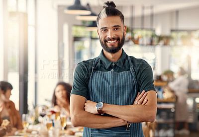 Buy stock photo Shot of a proud business owner in his restaurant