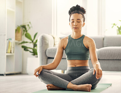 Buy stock photo Meditation, woman and lotus pose on living room floor for peace, mental health and wellness at home. Yoga, breathing and exercise by female meditating in a lounge for zen, holistic or chakra training