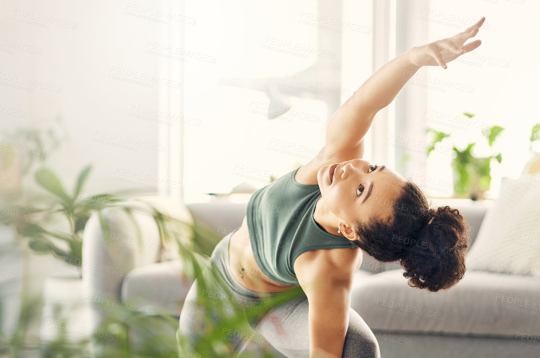 Buy stock photo Yoga, wellness and woman at home with zen, relax and arm stretching for health in a living room. Young female person, apartment and lounge with pilates and flexibility exercise in house feeling calm