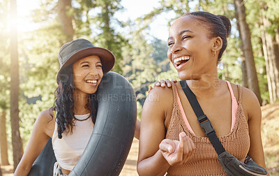 Buy stock photo Women friends, camping and smile in woods, sunshine or funny chat on adventure, bonding and freedom on holiday. African girl, together and happy people for summer vacation, forrest and walk in nature