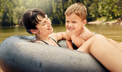 Buy stock photo Lake, swimming and parent with kid in water while camping in a forest for vacation or holiday together. Travel, swimming and mother bonding with child in nature for freedom, love and happiness