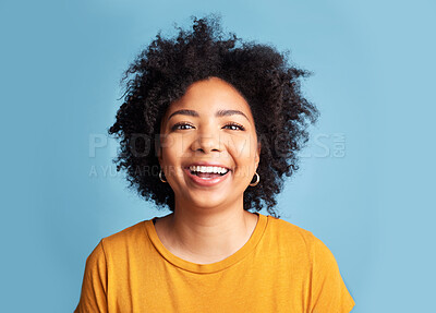 Buy stock photo Happy, woman and portrait with natural beauty, confidence or smile with makeup on studio blue background. Face, happiness and person with African hair, afro or cosmetics to care for hairstyle