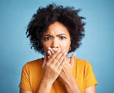 Buy stock photo Surprise, shock and portrait of a woman in studio with a wtf, omg or wow face expression. Shocked, emotion and headshot of young female model with scared gesture or emoji isolated by blue background.