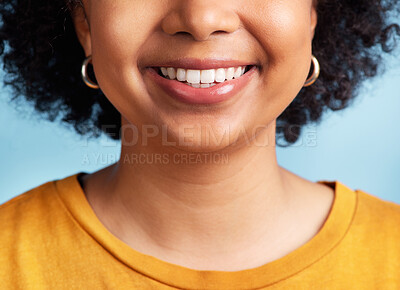 Buy stock photo Smile, woman and closeup of mouth and teeth for dental care, hygiene and whitening results. Happy, model and girl showing tooth for treatment progress isolated on a blue background in a studio