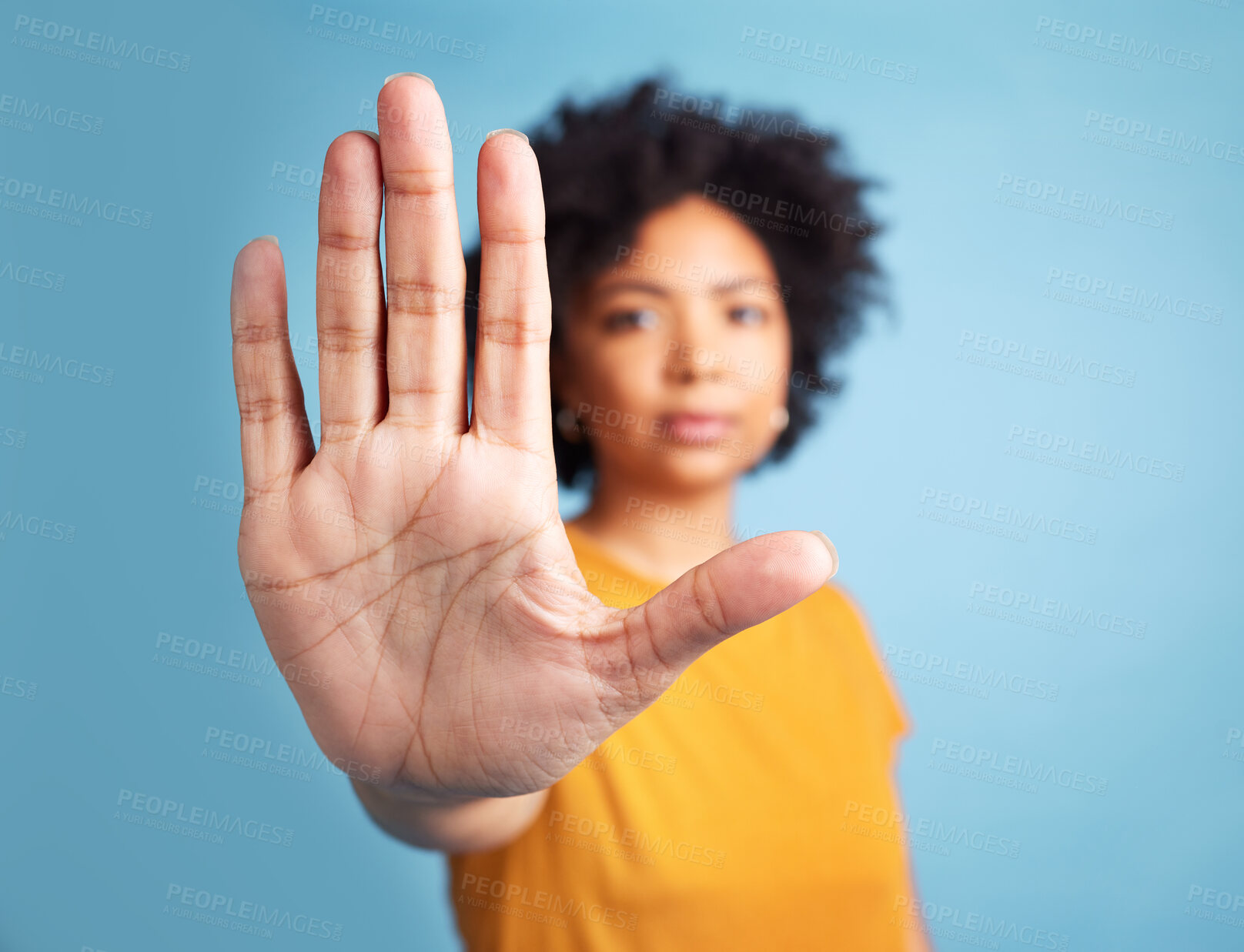 Buy stock photo Portrait, stop hand sign and woman in studio isolated on a blue background mockup space. African person, face and ban, rejection or warning, refuse or no palm to protest racism, human rights or emoji