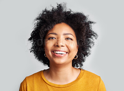 Buy stock photo Happy, woman and confident portrait in studio, white background and backdrop. Face of young female model, smile and natural curly afro hair with positive personality, gen z and girl of South Africa 