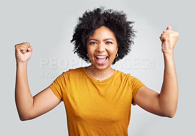 Buy stock photo Portrait, winner and wow with a woman in studio on a gray background celebrating a victory or success. Motivation, smile and celebration with a happy young female model cheering her own achievement