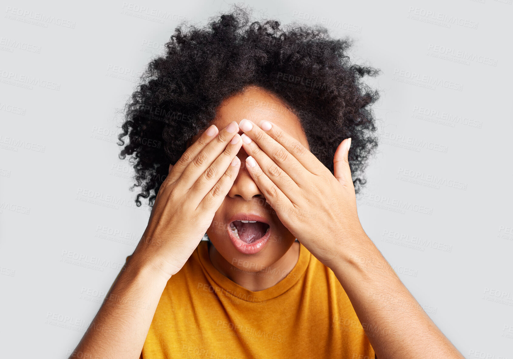 Buy stock photo Cover, shocked and hands on face of woman in studio for surprise, horror and fear. Wow, announcement and danger with female hiding on white background mockup for scared, alert and notification 