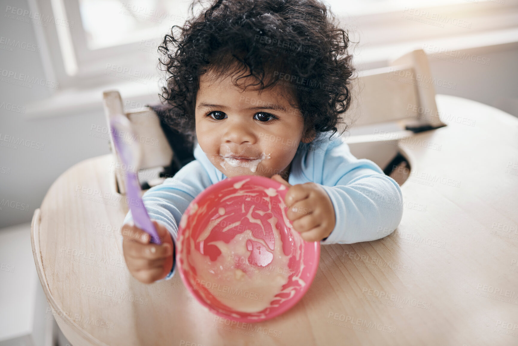 Buy stock photo Home, baby and playful with food for eating, nutrition or growth development with cereal for wellness. Chair, motor skills and child with porridge for digestive health, hungry or breakfast in morning