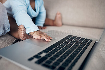 Buy stock photo Parent, hands and baby with laptop in home, playing and sensory touch for streaming entertainment. Person, infant feet and relax on couch for cartoon movies, bonding together and internet for film