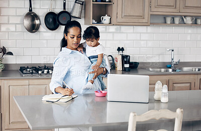 Buy stock photo Mother, child and multitasking with laptop for remote work, freelance notes and life balance in kitchen. Brand consultant, baby care or juggling task for time management, responsibility and notebook