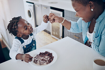 Buy stock photo Shot of a mother and daughter bonding at home