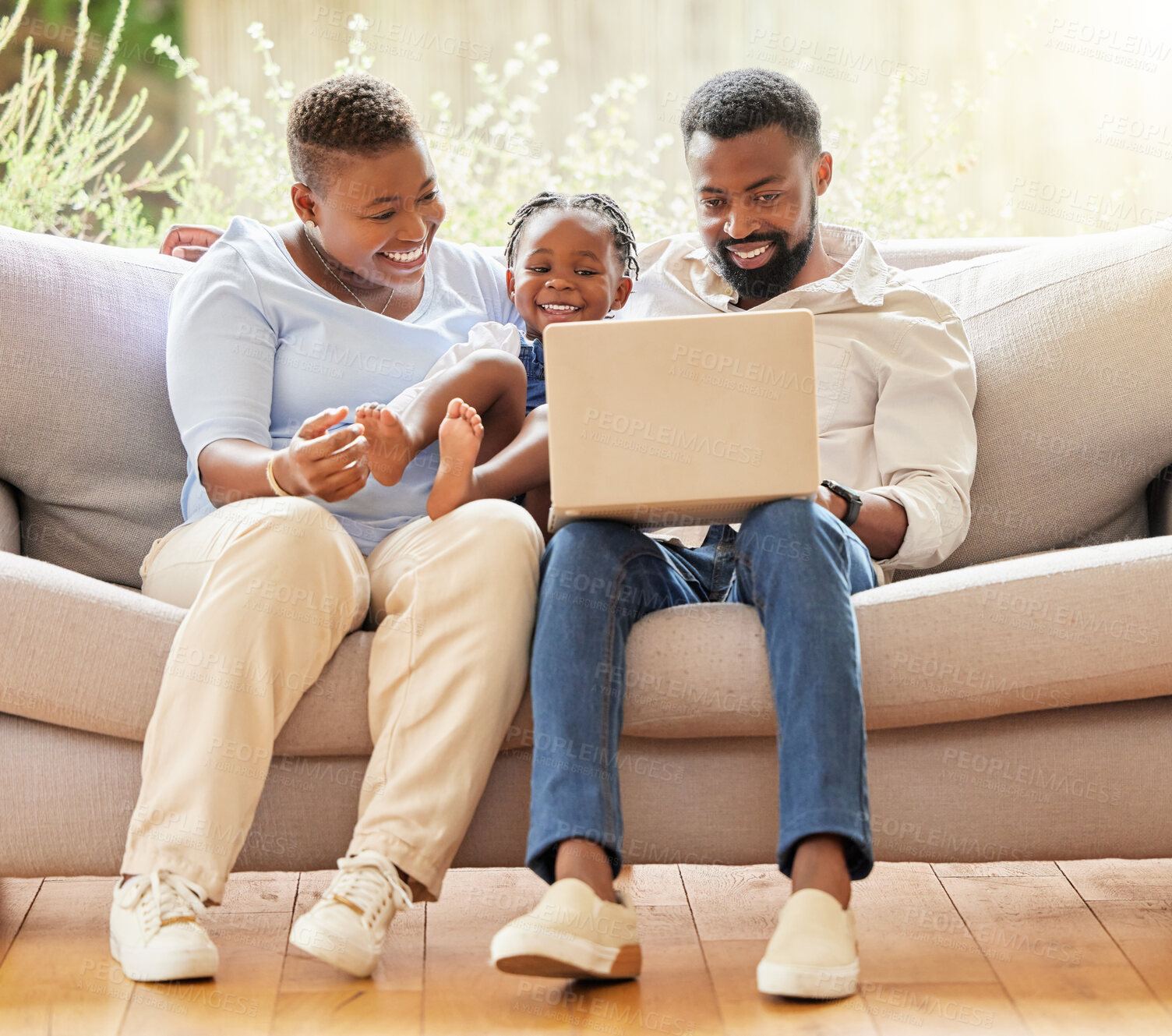 Buy stock photo Relax, parents and kid on couch with laptop for streaming, online movie and smile in living room. Happy black family, computer and child development on sofa with video, internet and bonding in home