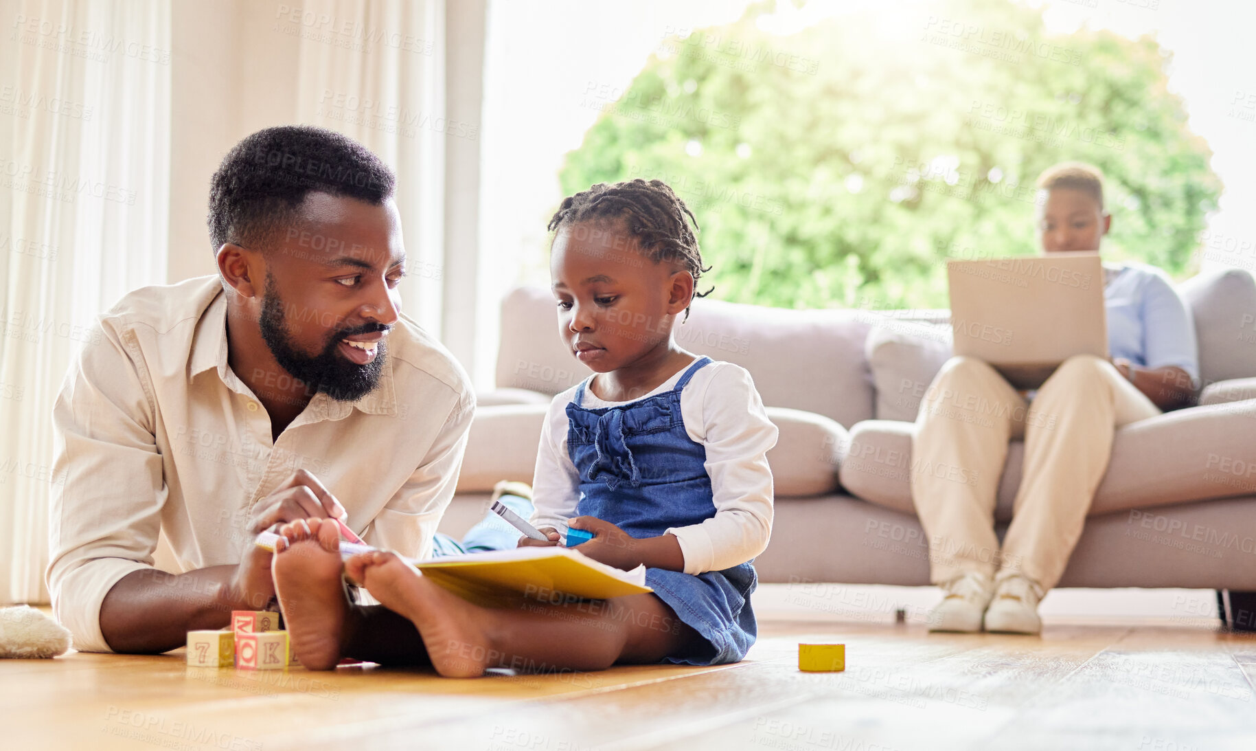 Buy stock photo Child, father and playing on floor in home together, childhood development and growth with parent on sofa. Mother, laptop and kid with notebook in apartment, learning and living room on weekend