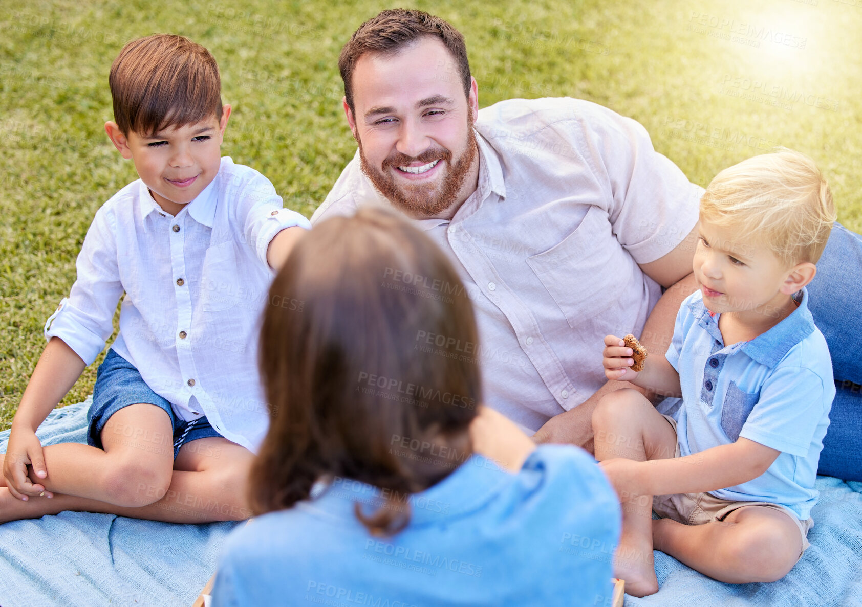 Buy stock photo Happy family, mother and kids on picnic in park to relax or smile in nature on holiday together for bonding. Dad, woman or mom with children siblings on blanket, lawn or grass for outdoor vacation