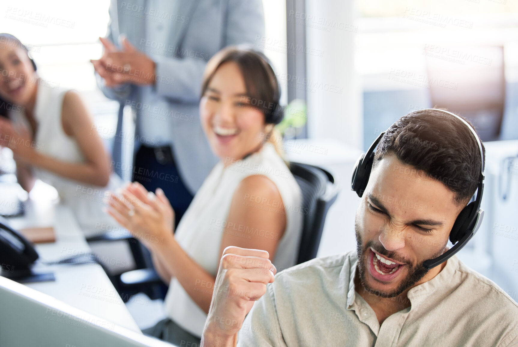 Buy stock photo Man, call center and happy with fist by computer for reaching target, bonus and deadline. People, employees and excited with clapping hands on headset at office for celebration, victory and winning