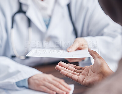 Buy stock photo Closeup shot of an unrecognisable doctor giving a patient a letter during a consultation in a medical office