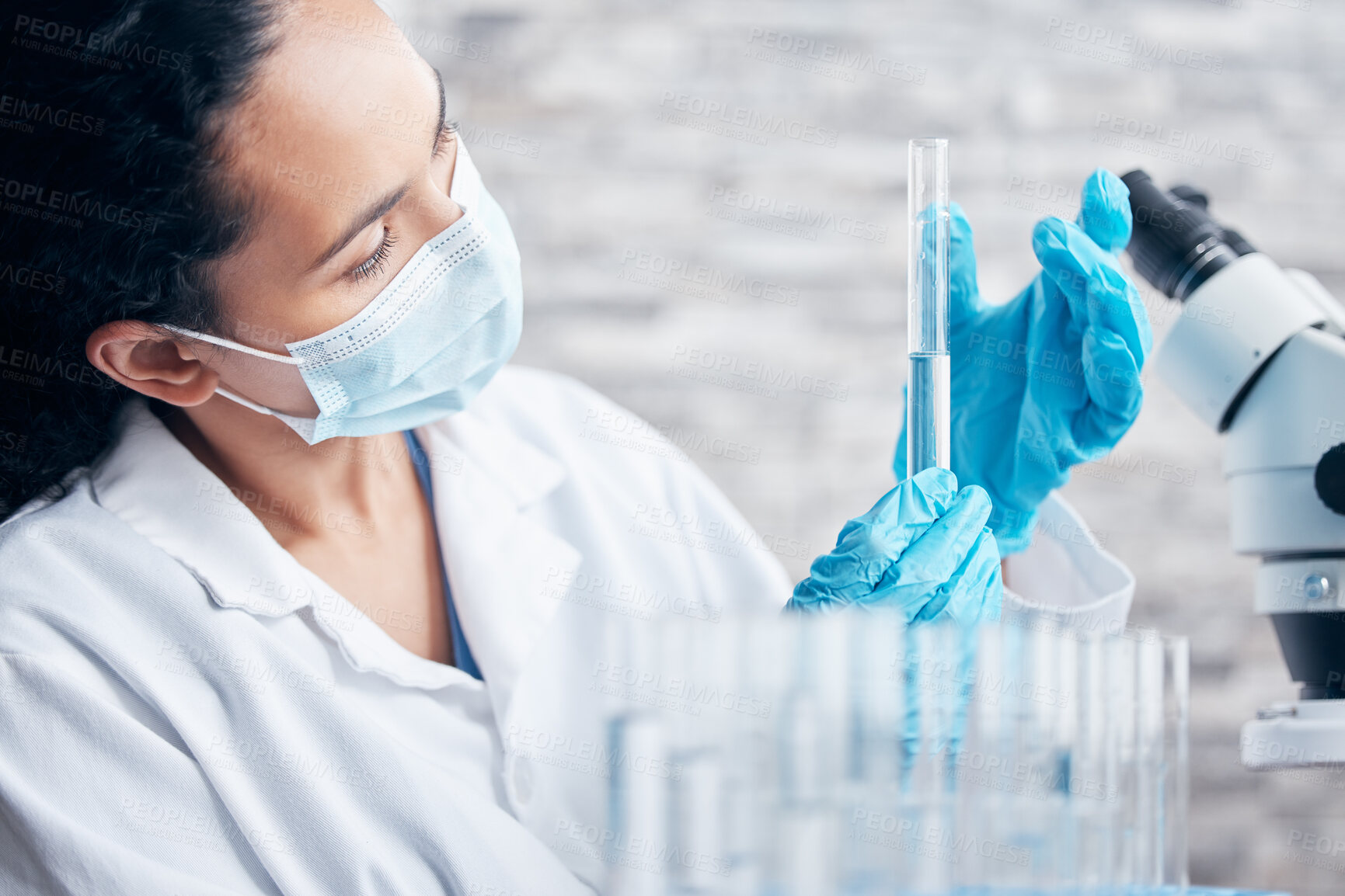 Buy stock photo Woman, mask and test tube for innovation in laboratory for research, medical care and health. Scientist, ppe and working in clinic for pharmaceutical company and investigation for vaccine or safety