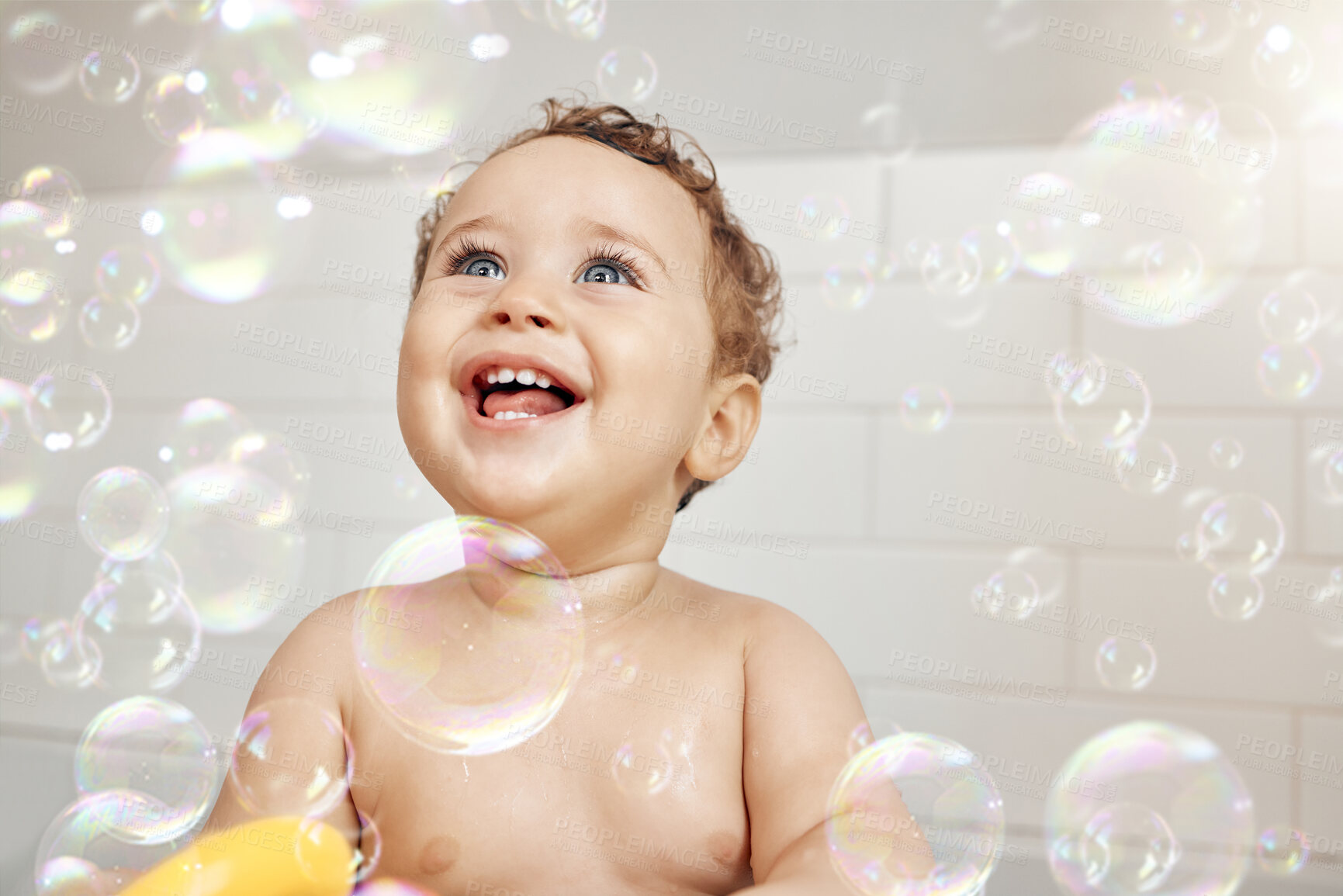 Buy stock photo Bubbles, baby and happy in bathroom for bath, cleaning and hygiene with night time routine for growth or development. Toddler, home and washing in bathtub for skin care, cute and playful in house