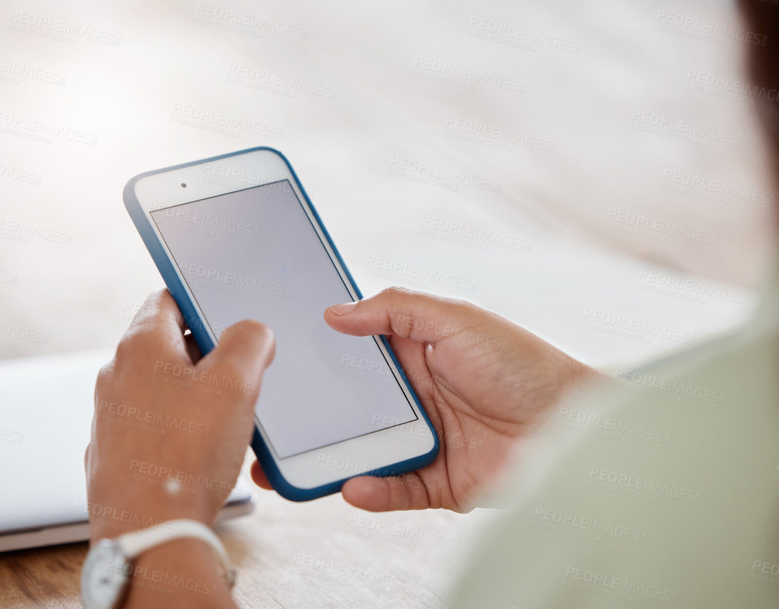 Buy stock photo Woman, hands and phone with mockup screen for social media update, internet scroll and connection in home. Female person, typing and mobile with marketing space for promotion and online app review