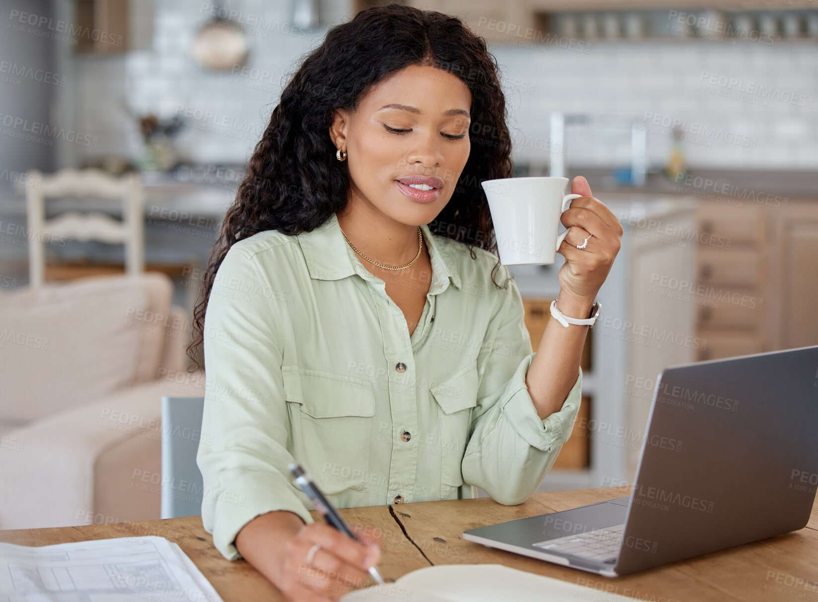 Buy stock photo Black woman, coffee and laptop on desk with writing for planning strategy, remote work and online project in home. African lady, tea and computer for copywriting research with freelance job and notes