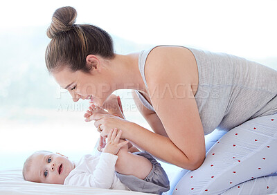 Buy stock photo Home, baby and mother playful in bed, caring and bonding together in morning. Family house, woman or mama with boy infant in bedroom for support, connection and love of parent for adorable kid