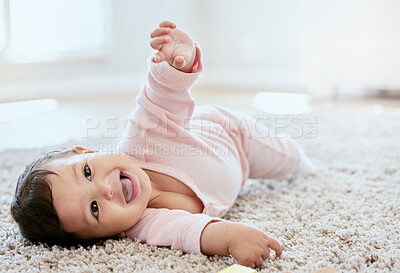 Buy stock photo Happy, laughing and baby on floor in home for child development, wellness and growth. Family, childhood and fun of young infant in living room for learning to crawl, playing and relax in house