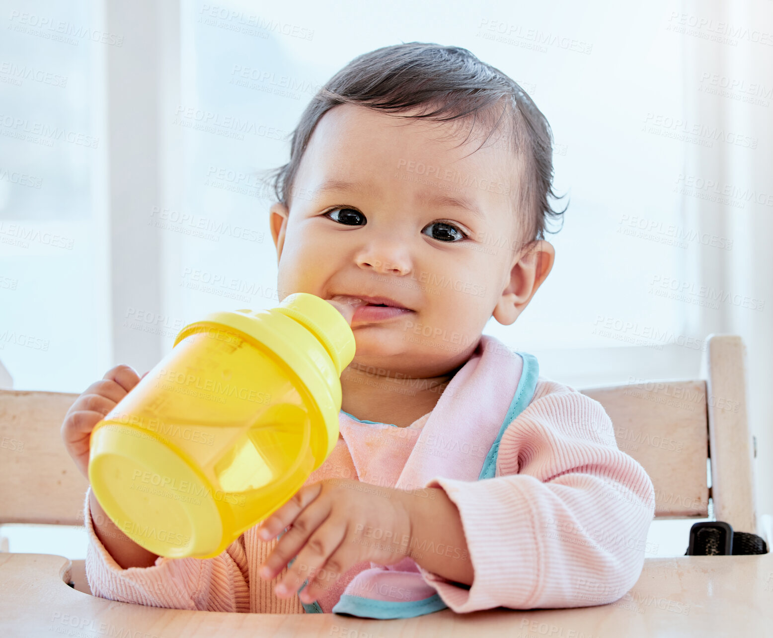 Buy stock photo Girl, baby and drink with bottle in portrait for nutrition, growth or formula for health in family home. Infant, child and smile for milk, juice and breakfast for development with wellness in morning