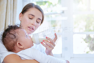 Buy stock photo Mother, milk and feeding baby with bottle by window for nutrition, vitamin or diet at home. Mom holding newborn, child or kid in childcare, health or wellness for drink, meal or snack time at house