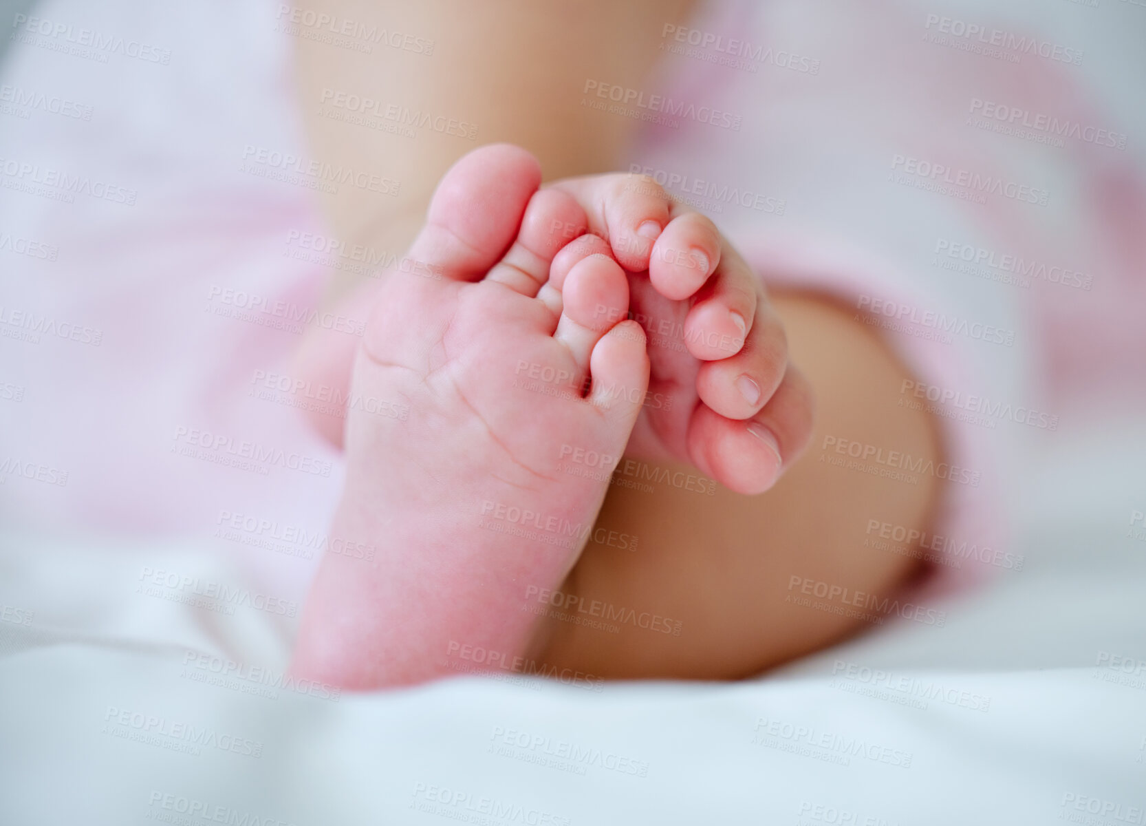 Buy stock photo Home, bed and feet of baby for relax, resting and calm in nursery for sleeping or wake up in morning. Family, home and closeup of newborn in bedroom for child development, dreaming and wellness