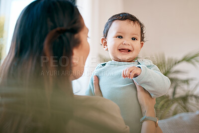 Buy stock photo Family, love and mother play with baby for bonding, quality time and child development together at home. New born, motherhood and happy mom carry infant for care, support and affection in living room