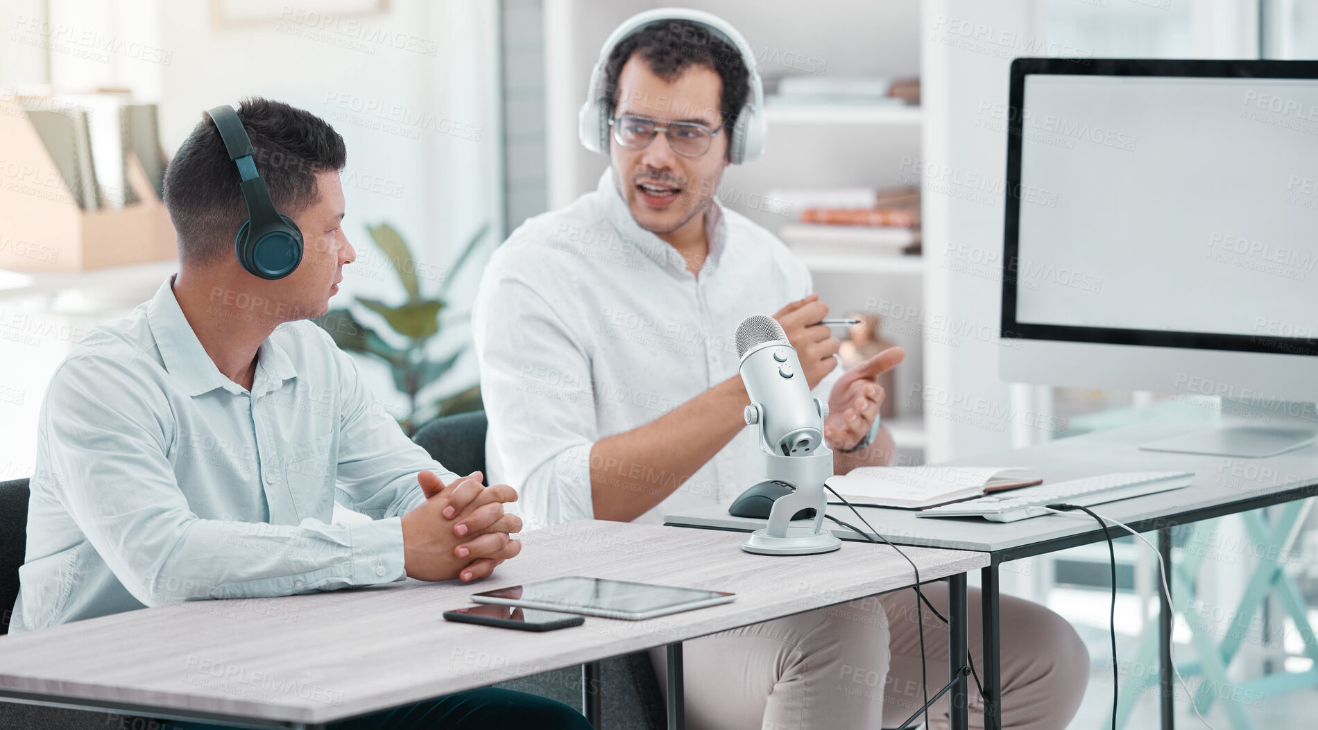 Buy stock photo Broadcast, radio interview and presenter for discussion, share opinion and talk show on ai topic. Office, headphones and microphone of male journalist as host, speaker and guest for online podcast