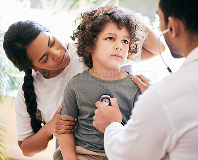 Buy stock photo Shot of a little boy being examined by an unrecognizable doctor while his mother holds him