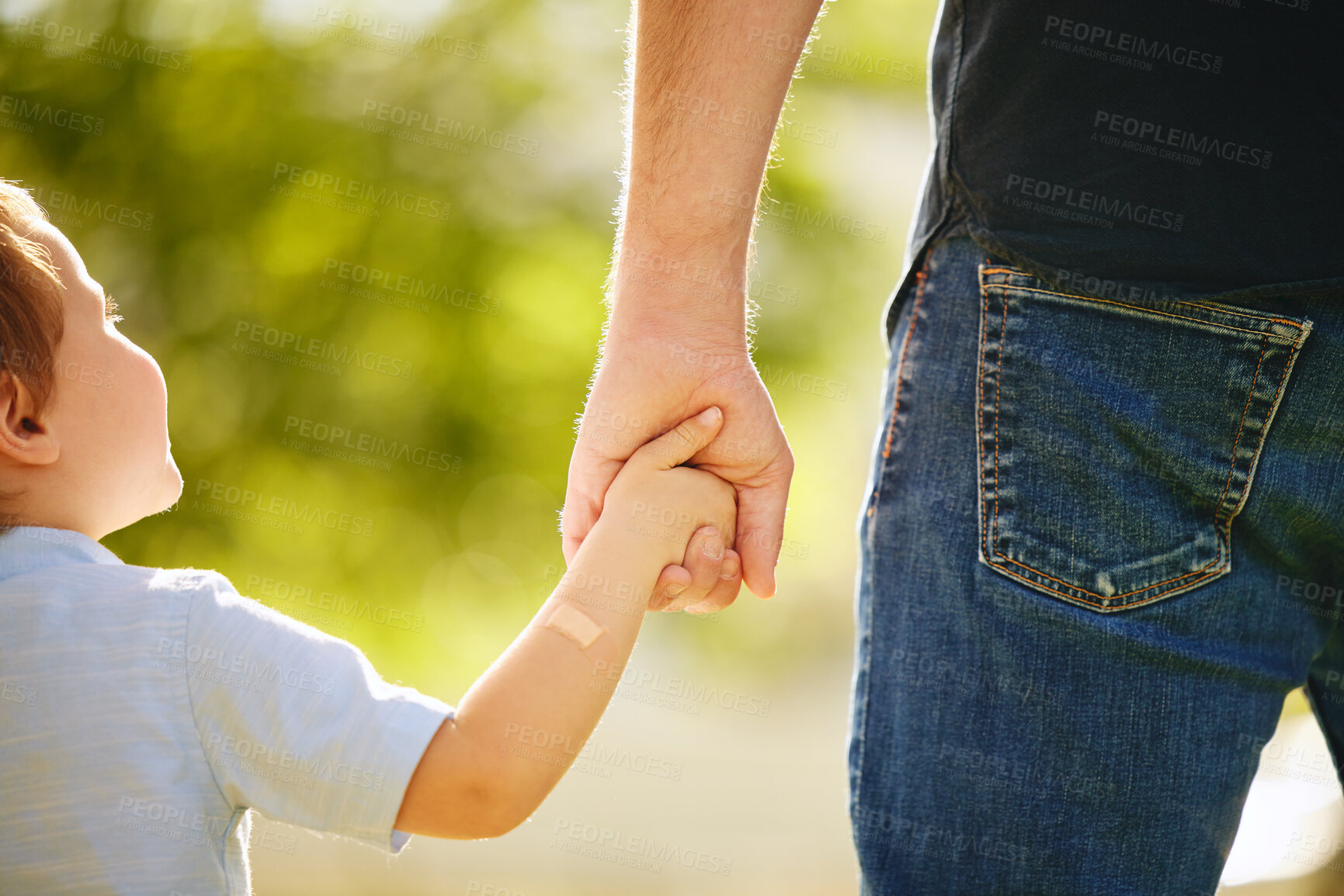 Buy stock photo Man, child and holding hands back outdoor park together for bonding, love and support on summer vacation. Father, son and walking with care, trust and morning travel for holiday freedom of memory