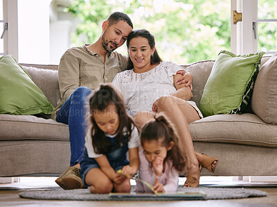 Buy stock photo Family, girls and kids reading book in living room for relax, storytelling and development in home. Mother, father and siblings learning together for education, studying and happy parents on sofa