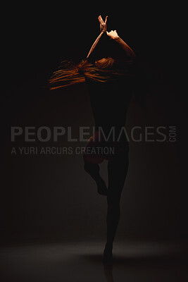 Buy stock photo Dancing, woman and ballet in studio with performance, turn and dark background with balance. Shadow, art and pose with ballerina routine of dancer and performer with silhouette and creativity 