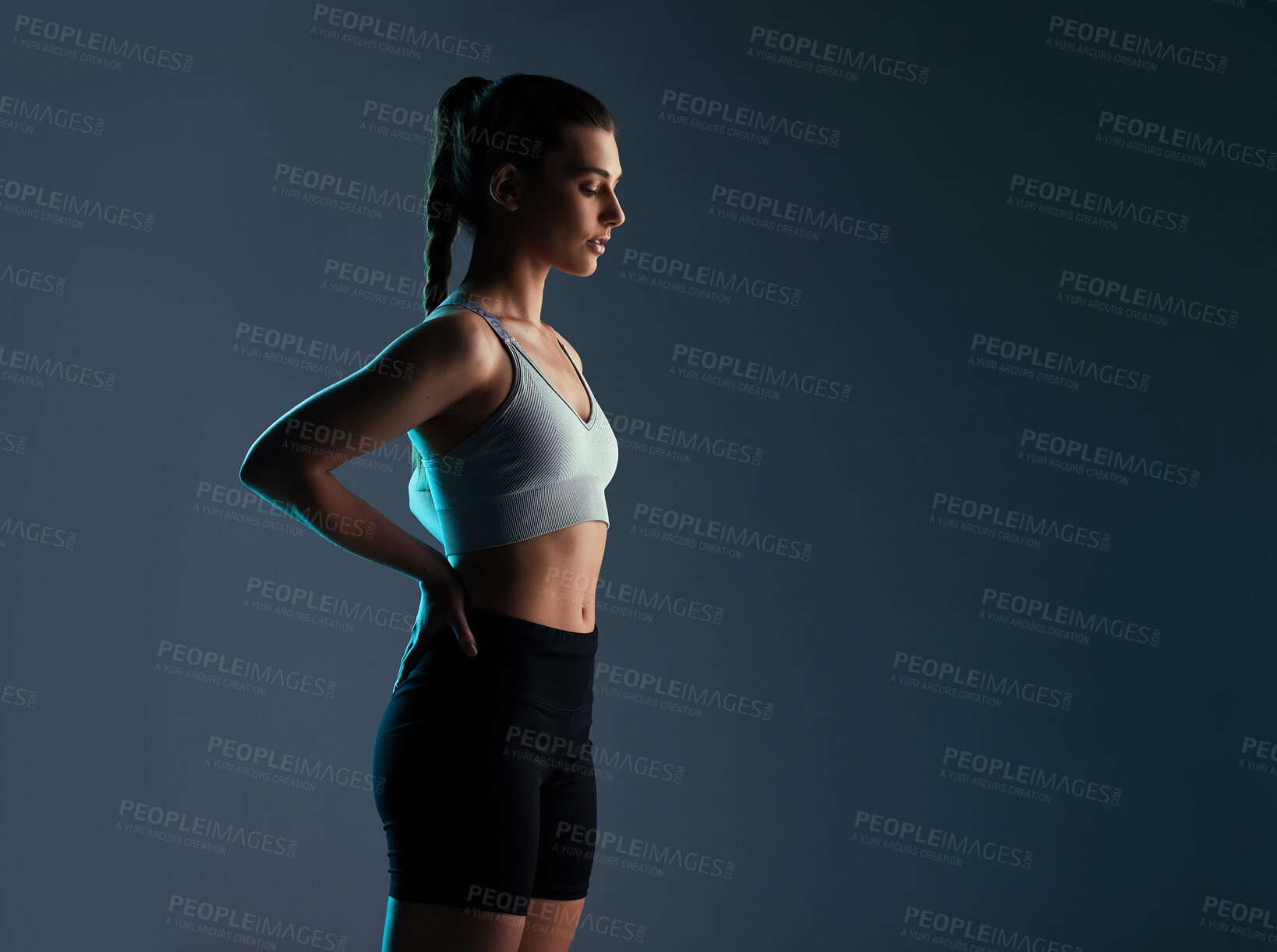 Buy stock photo Healthy, woman and model fitness in studio with activewear for workout goals, body progress and mockup space. Athlete, person and shadow with sportswear for training and exercise on gray background