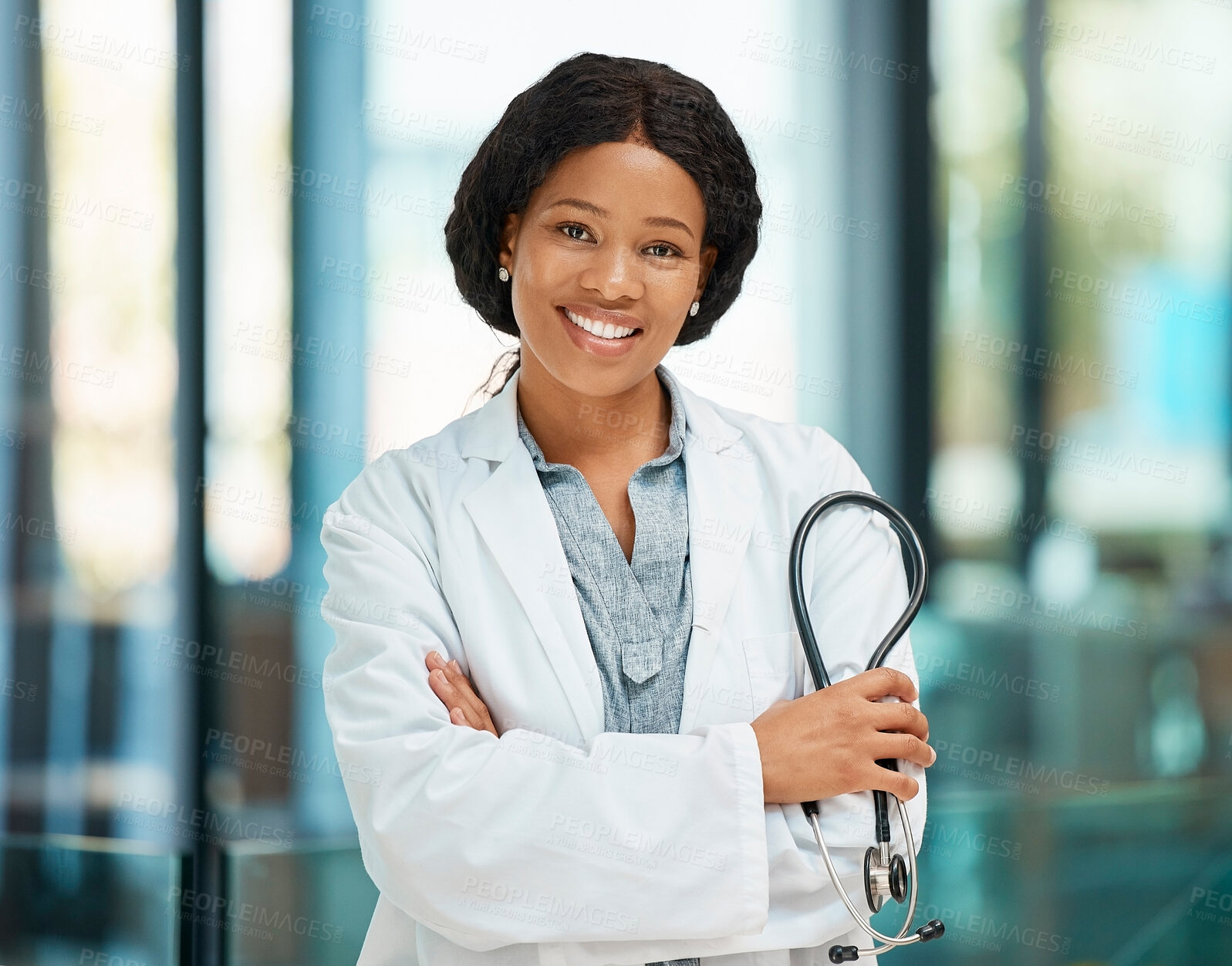 Buy stock photo Happy, portrait and doctor with black woman, arms crossed and confidence of medical support job. Hospital, smile and healthcare professional with stethoscope and cardiology clinic employee at work