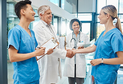 Buy stock photo Healthcare, doctor and nurse handshake in a hospital to welcome or celebrate success. Men and women medical group together for teamwork and shaking hands for collaboration with trust and support