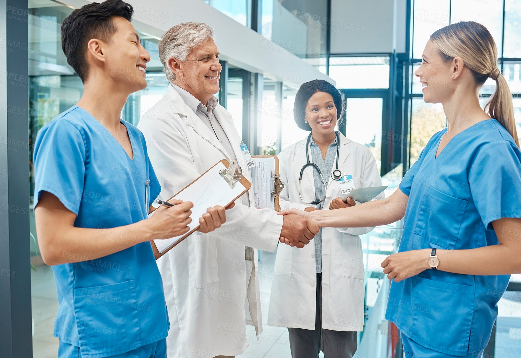 Buy stock photo Healthcare, doctor and nurse handshake in a hospital to welcome or celebrate success. Men and women medical group together for teamwork and shaking hands for collaboration with trust and support