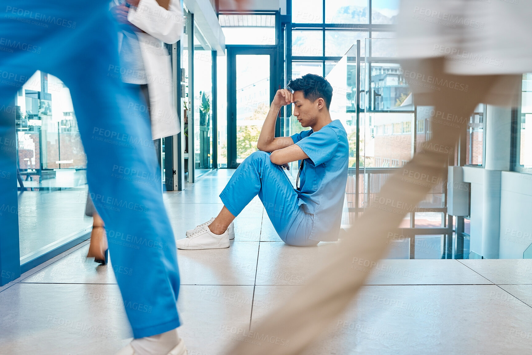 Buy stock photo Stress, man and surgeon with fatigue, burnout or anxiety for healthcare mistake with patient loss in hospital. Sad, surgery fail and medical nurse thinking of grief, crisis and tired in busy clinic