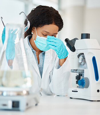 Buy stock photo Microscope, scientist and woman with stress in lab for burnout, headache and overworked on sample analysis. Science, expert and mask with anxiety for medical research and investigation crisis