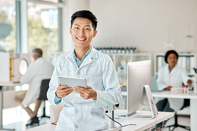 Buy stock photo Asian man, tablet and portrait of a scientist in laboratory, hospital or research for medicine, chemistry or innovation. Doctor, technology and medical worker with smile in clinic or science lab