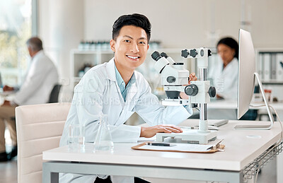 Buy stock photo Portrait, science and microscope with an asian man doctor working in a lab for research or innovation. Healthcare, medical and investigation with a male scientist working in a laboratory for analysis