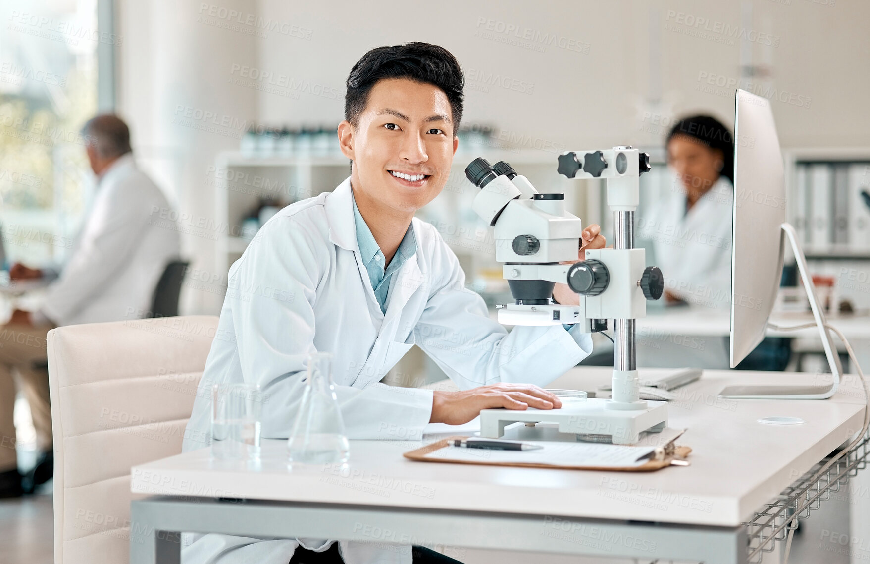 Buy stock photo Portrait, science and microscope with an asian man doctor working in a lab for research or innovation. Healthcare, medical and investigation with a male scientist working in a laboratory for analysis